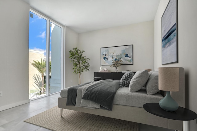 220 SE Mizner Blvd Unit Ph920, Boca Raton, FL 33432 - bedroom featuring access to exterior, floor to ceiling windows, and baseboards