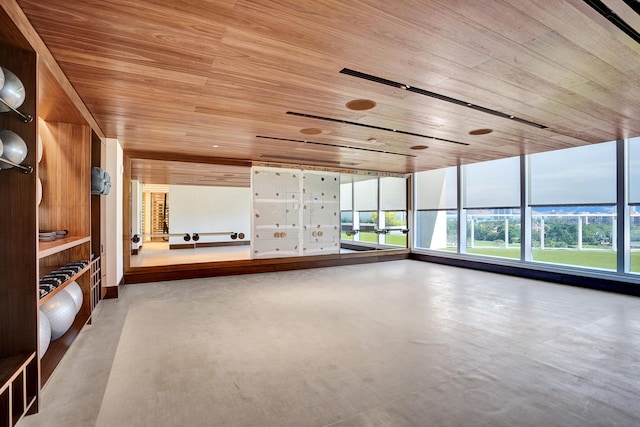 220 SE Mizner Blvd Unit Ph920, Boca Raton, FL 33432 - unfurnished living room featuring wood ceiling, healthy amount of natural light, and finished concrete floors