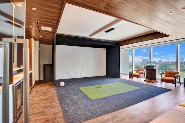 220 SE Mizner Blvd Unit Ph920, Boca Raton, FL 33432 - playroom featuring wooden ceiling, golf simulator, recessed lighting, wood finished floors, and a wall of windows