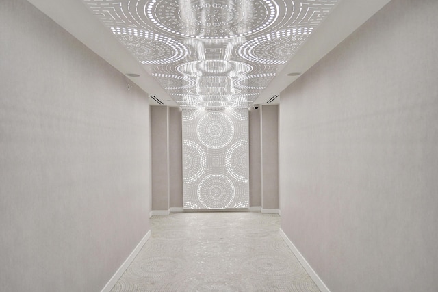 220 SE Mizner Blvd Unit Ph920, Boca Raton, FL 33432 - hallway featuring baseboards and a chandelier