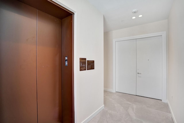 220 SE Mizner Blvd Unit Ph920, Boca Raton, FL 33432 - corridor with elevator, baseboards, and recessed lighting
