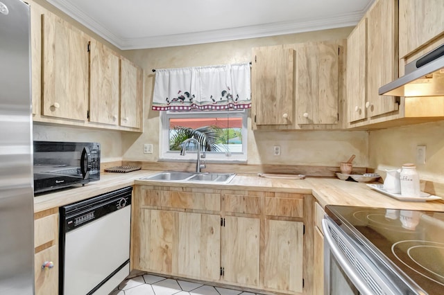 654 Bunting Dr, Delray Beach, FL 33444 - kitchen with stainless steel appliances, light brown cabinets, and a sink