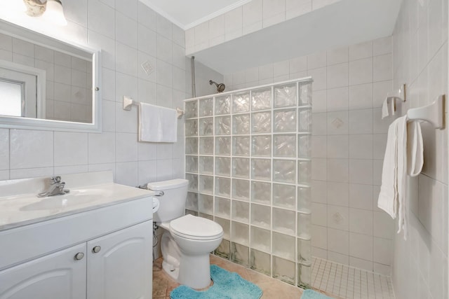 654 Bunting Dr, Delray Beach, FL 33444 - bathroom with a walk in shower, tile walls, tile patterned flooring, vanity, and ornamental molding