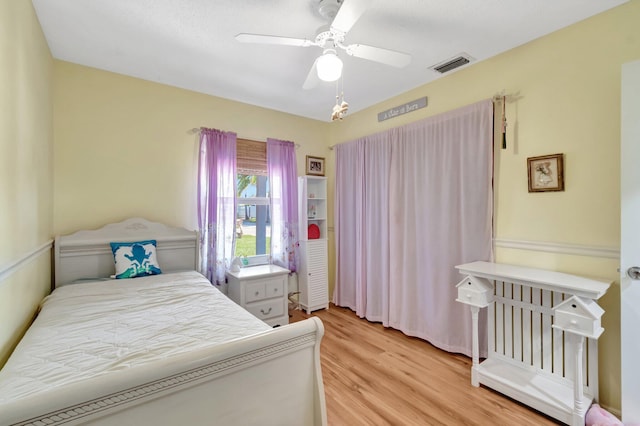 654 Bunting Dr, Delray Beach, FL 33444 - bedroom featuring light wood-style flooring, a ceiling fan, and visible vents