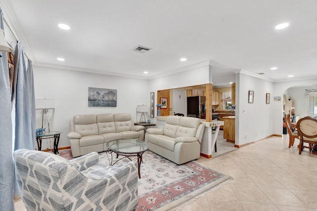 654 Bunting Dr, Delray Beach, FL 33444 - living room featuring ornamental molding, baseboards, arched walkways, and recessed lighting