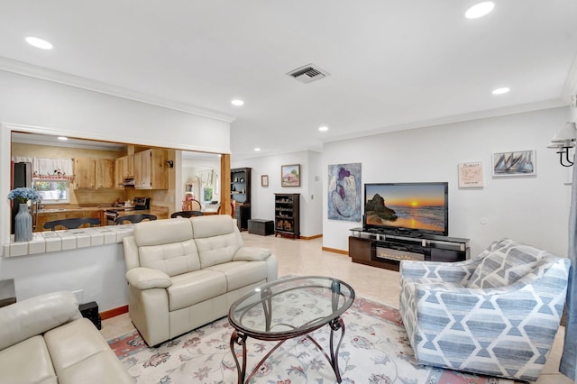 654 Bunting Dr, Delray Beach, FL 33444 - living area featuring baseboards, recessed lighting, crown molding, and visible vents