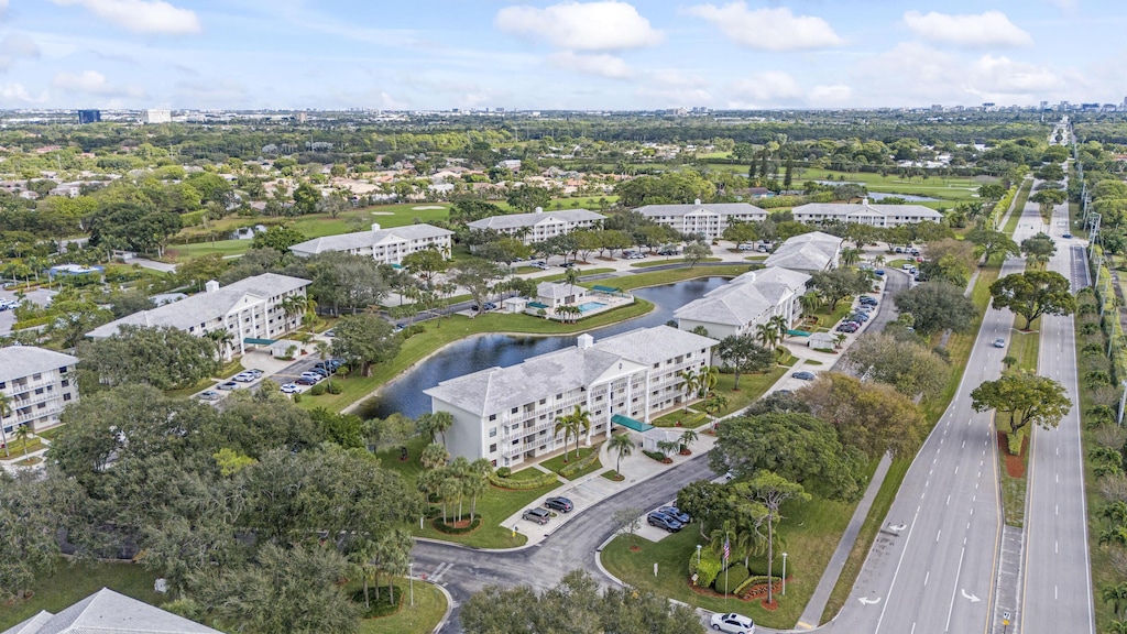 6169 Balboa Cir Unit 101, Boca Raton, FL 33433 - drone / aerial view featuring a water view