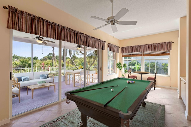 4922 SE Heartleaf Ter, Hobe Sound, FL 33455 - game room with tile patterned floors, ceiling fan, billiards, baseboards, and a textured ceiling