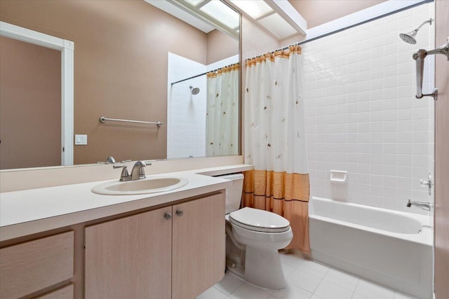 4922 SE Heartleaf Ter, Hobe Sound, FL 33455 - bathroom with tile patterned flooring, toilet, vanity, and shower / tub combo