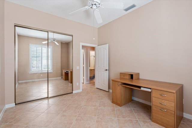 4922 SE Heartleaf Ter, Hobe Sound, FL 33455 - unfurnished office with a ceiling fan, light tile patterned floors, and baseboards