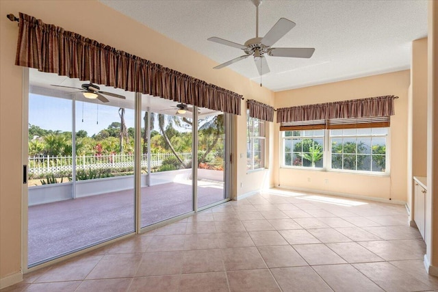 4922 SE Heartleaf Ter, Hobe Sound, FL 33455 - unfurnished sunroom featuring a ceiling fan