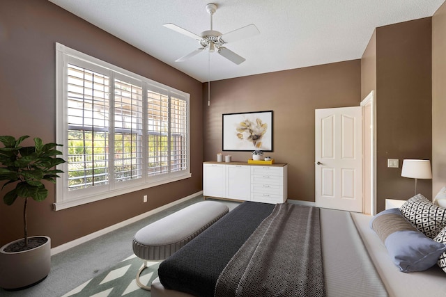 4922 SE Heartleaf Ter, Hobe Sound, FL 33455 - carpeted bedroom featuring baseboards and a ceiling fan