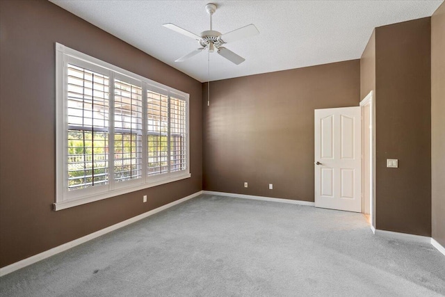 4922 SE Heartleaf Ter, Hobe Sound, FL 33455 - carpeted spare room with ceiling fan and baseboards