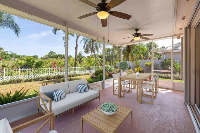 4922 SE Heartleaf Ter, Hobe Sound, FL 33455 - view of patio with outdoor dining space, a fenced backyard, outdoor lounge area, and ceiling fan