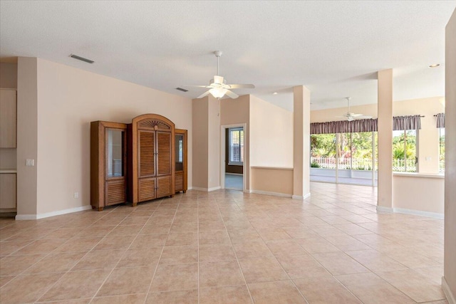 4922 SE Heartleaf Ter, Hobe Sound, FL 33455 - unfurnished room featuring a ceiling fan, light tile patterned flooring, and baseboards