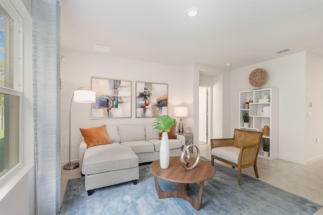 356 SW Prima Vista Blvd, Port Saint Lucie, FL 34953 - living area featuring baseboards and visible vents