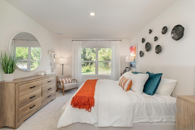 356 SW Prima Vista Blvd, Port Saint Lucie, FL 34953 - bedroom featuring visible vents and light colored carpet