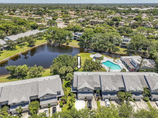 birds eye view of property with a water view