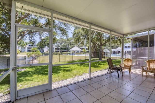 sunroom with a residential view