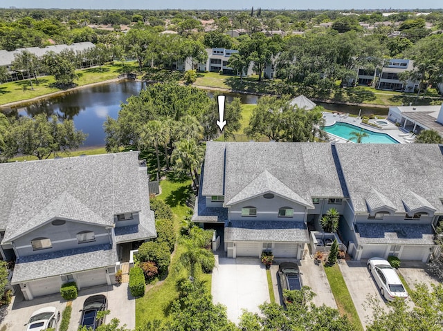 bird's eye view with a water view