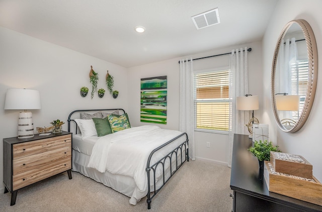 bedroom featuring light carpet, baseboards, visible vents, and recessed lighting