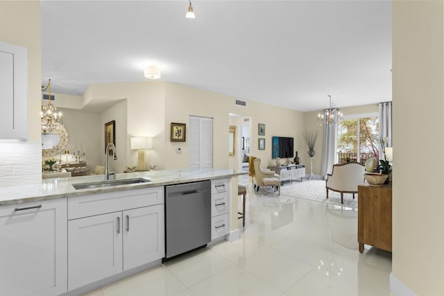 250 NE 3rd Ave Unit 1308, Delray Beach, FL 33444 - kitchen with dishwasher, open floor plan, a sink, and a notable chandelier