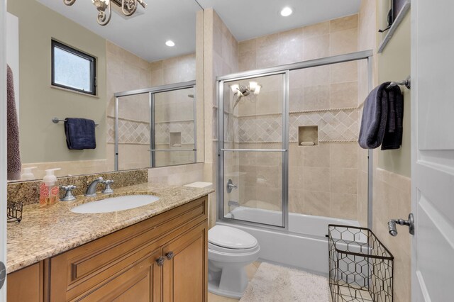 22175 Larkspur Trl, Boca Raton, FL 33433 - full bathroom with enclosed tub / shower combo, toilet, vanity, and recessed lighting