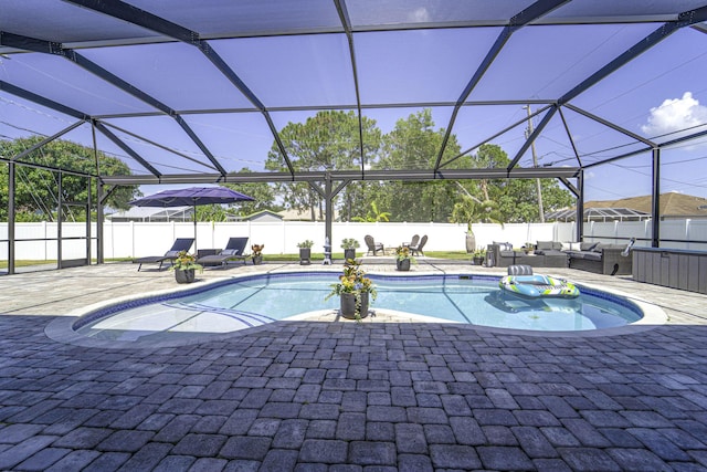 view of pool featuring an outdoor hangout area, a patio, a fenced backyard, and a fenced in pool