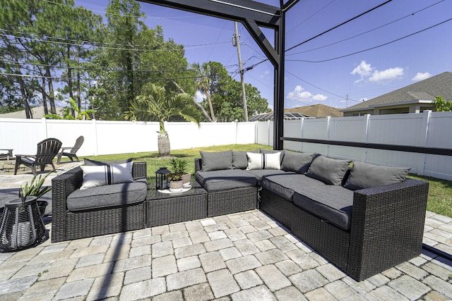 view of patio featuring a fenced backyard and an outdoor living space