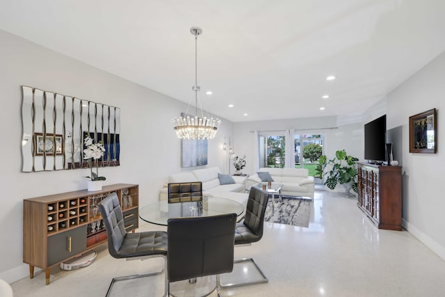 701 NE Harbour Ter Unit 103, Boca Raton, FL 33431 - dining area with recessed lighting, baseboards, and a chandelier