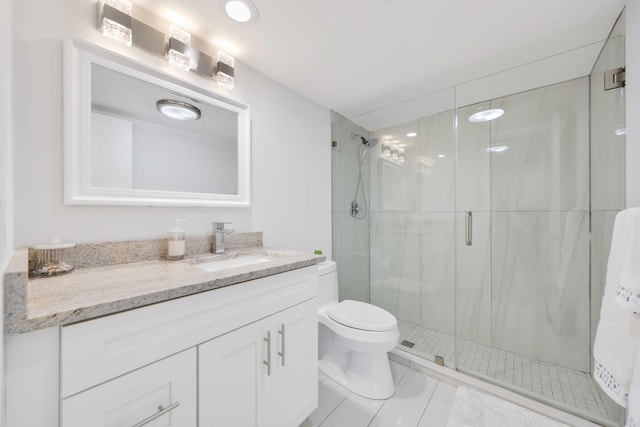 701 NE Harbour Ter Unit 103, Boca Raton, FL 33431 - bathroom featuring a shower stall, vanity, and toilet
