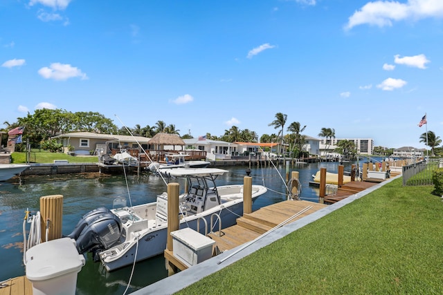 701 NE Harbour Ter Unit 103, Boca Raton, FL 33431 - dock area with a water view and a yard