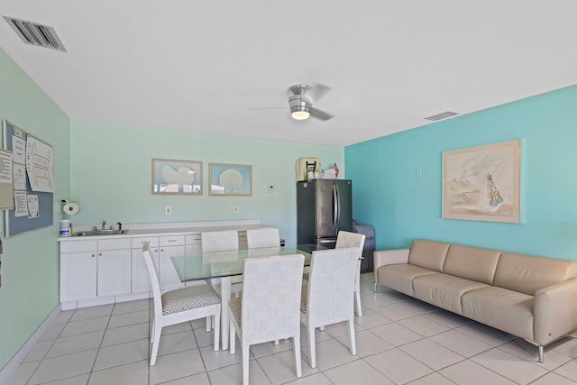 701 NE Harbour Ter Unit 103, Boca Raton, FL 33431 - dining space featuring a ceiling fan and light tile patterned flooring