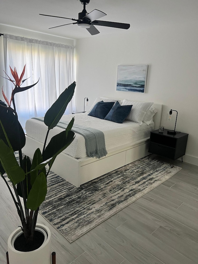 3551 Inverrary Dr Unit 203, Lauderhill, FL 33319 - bedroom featuring a ceiling fan and wood finished floors