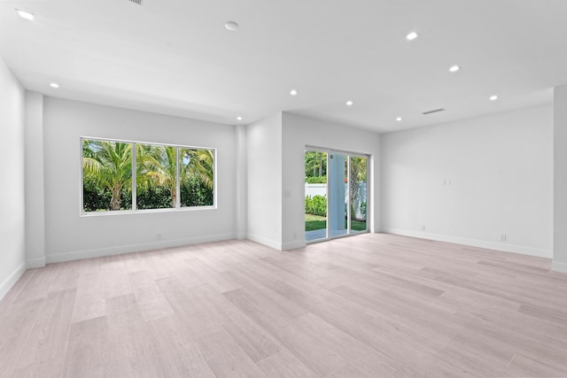 126 Auburn Dr, Lake Worth Beach, FL 33460 - spare room featuring light wood-type flooring, baseboards, and recessed lighting