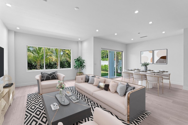 126 Auburn Dr, Lake Worth Beach, FL 33460 - living area with baseboards, light wood finished floors, and recessed lighting