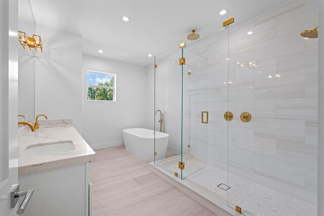 126 Auburn Dr, Lake Worth Beach, FL 33460 - bathroom with a stall shower, a freestanding tub, and a sink