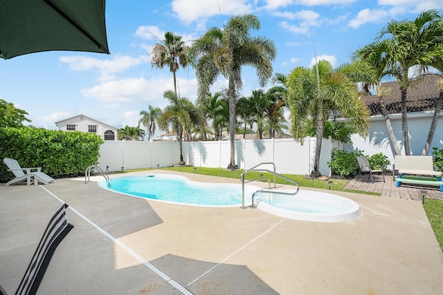view of pool with a patio area, a fenced in pool, and a fenced backyard
