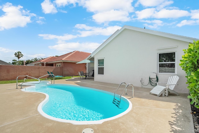 view of pool with fence, a patio, and a fenced in pool