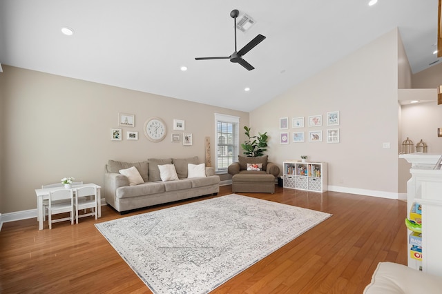 living room featuring recessed lighting, ceiling fan, and wood finished floors