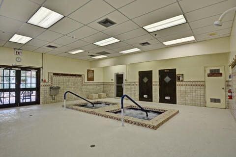 10137 Mangrove Dr Unit 203, Boynton Beach, FL 33437 - community lobby with a paneled ceiling and wainscoting