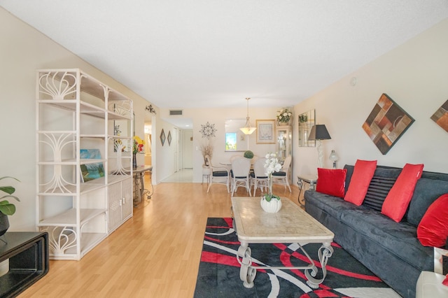 14360 Strathmore Ln Unit 404, Delray Beach, FL 33446 - living area with visible vents and wood finished floors