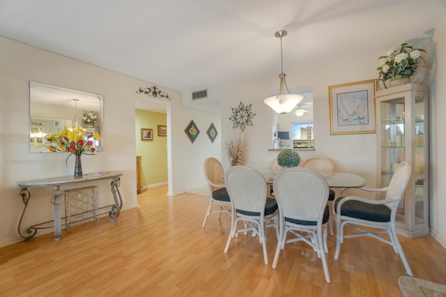 14360 Strathmore Ln Unit 404, Delray Beach, FL 33446 - dining space with visible vents and wood finished floors