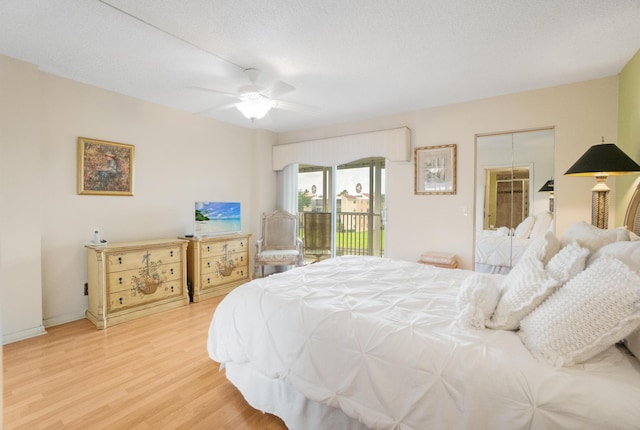 14360 Strathmore Ln Unit 404, Delray Beach, FL 33446 - bedroom featuring light wood-style flooring, a ceiling fan, and access to exterior