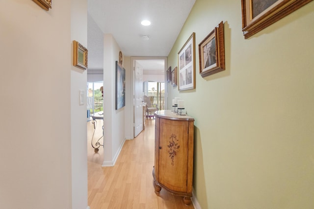 14360 Strathmore Ln Unit 404, Delray Beach, FL 33446 - hall featuring light wood-style flooring and baseboards