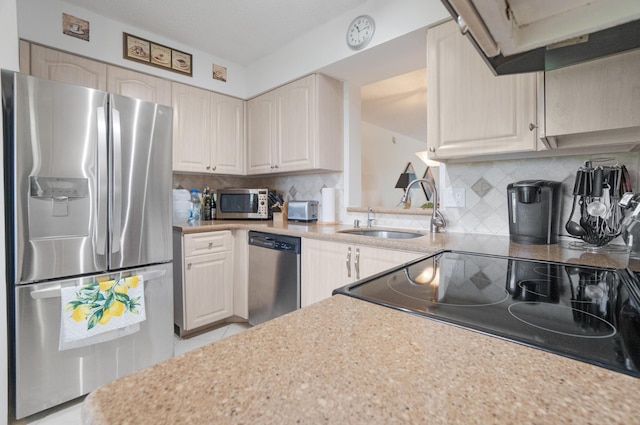 14360 Strathmore Ln Unit 404, Delray Beach, FL 33446 - kitchen with light countertops, stainless steel appliances, decorative backsplash, and a sink