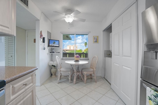 14360 Strathmore Ln Unit 404, Delray Beach, FL 33446 - dining room featuring ceiling fan, light tile patterned flooring, baseboards, and visible vents