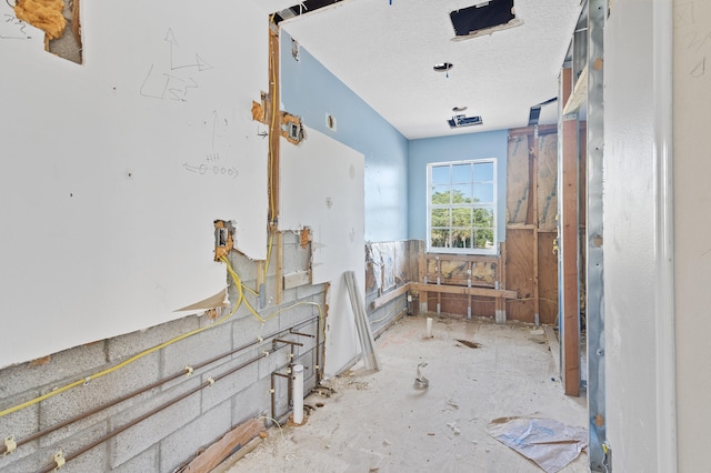 2924 Deer Run Trl, Loxahatchee, FL 33470 - miscellaneous room featuring a textured ceiling