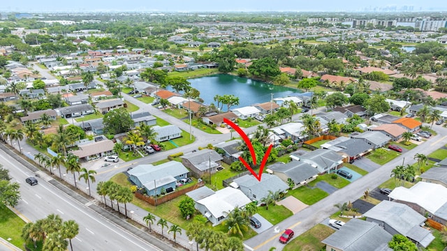 4902 NW 27th Way, Tamarac, FL 33309 - aerial overview of property's location with a nearby body of water and nearby suburban area