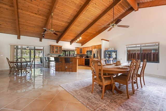 650 NW 48th Ave, Coconut Creek, FL 33063 - dining area featuring light tile patterned flooring, wood ceiling, a ceiling fan, and high vaulted ceiling
